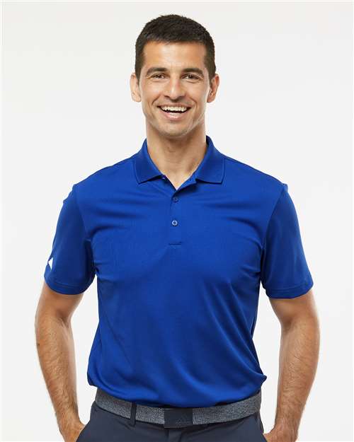 Man wearing a blue polo shirt on a white background