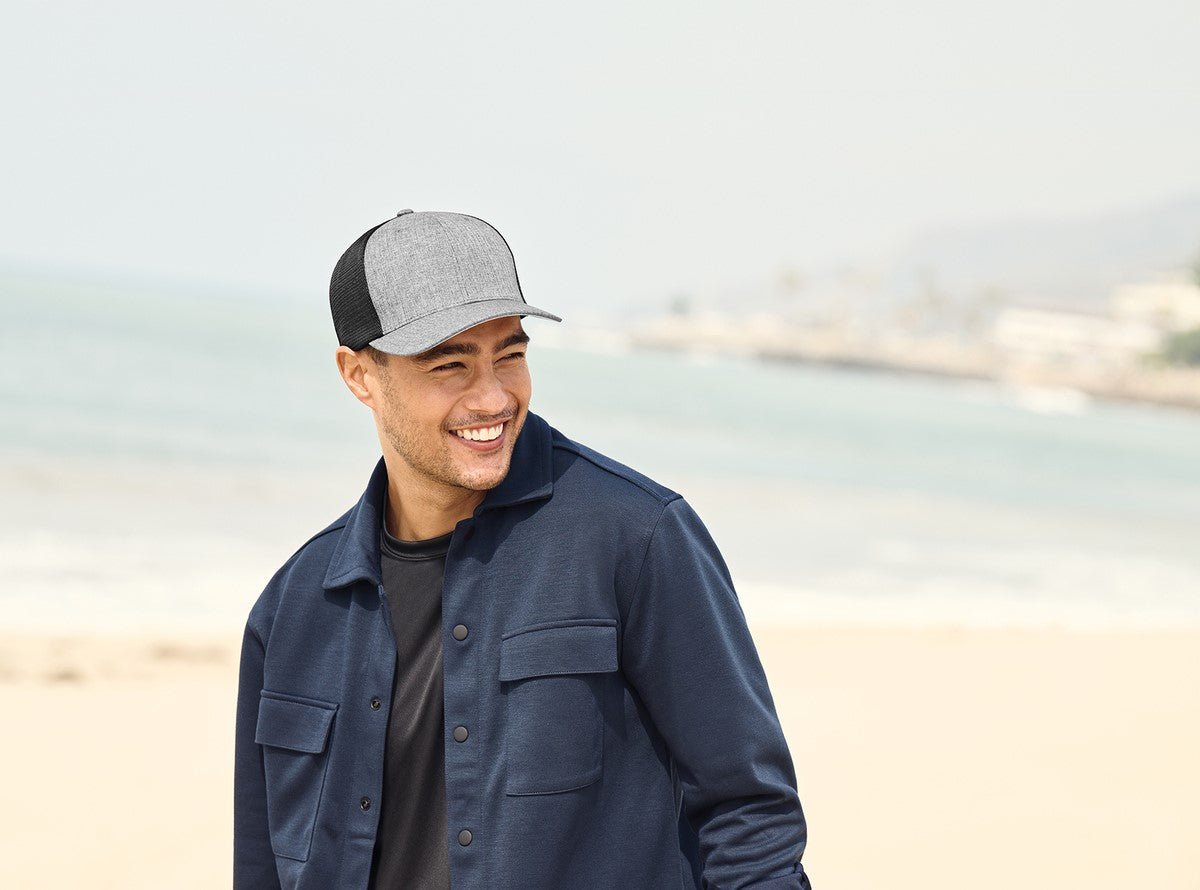 man wearing port authority 110 flexfit