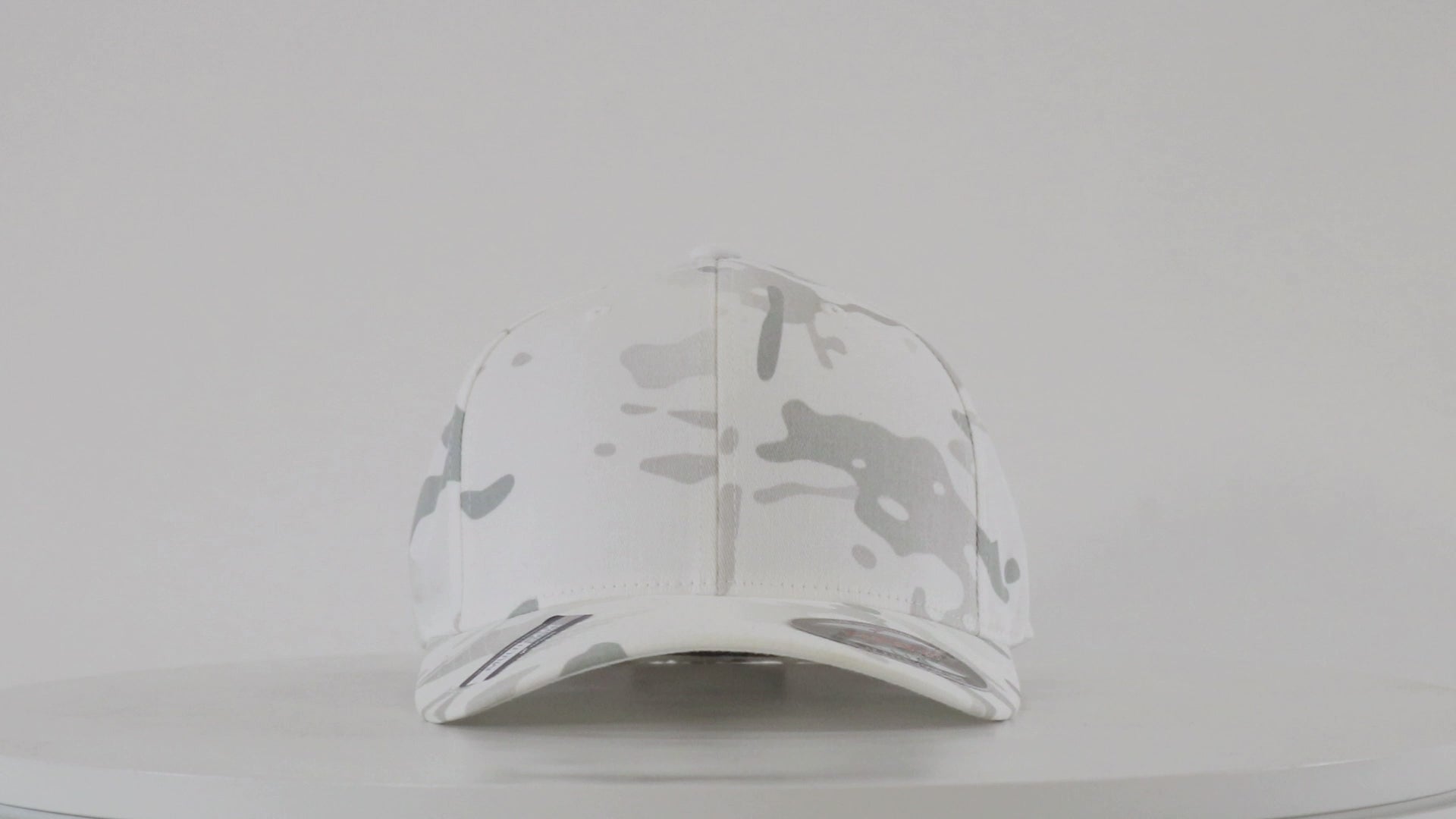 Custom Flexfit 6277 embroidered cap with structured front, stretch fit, Permacurv visor, and clean logo decoration